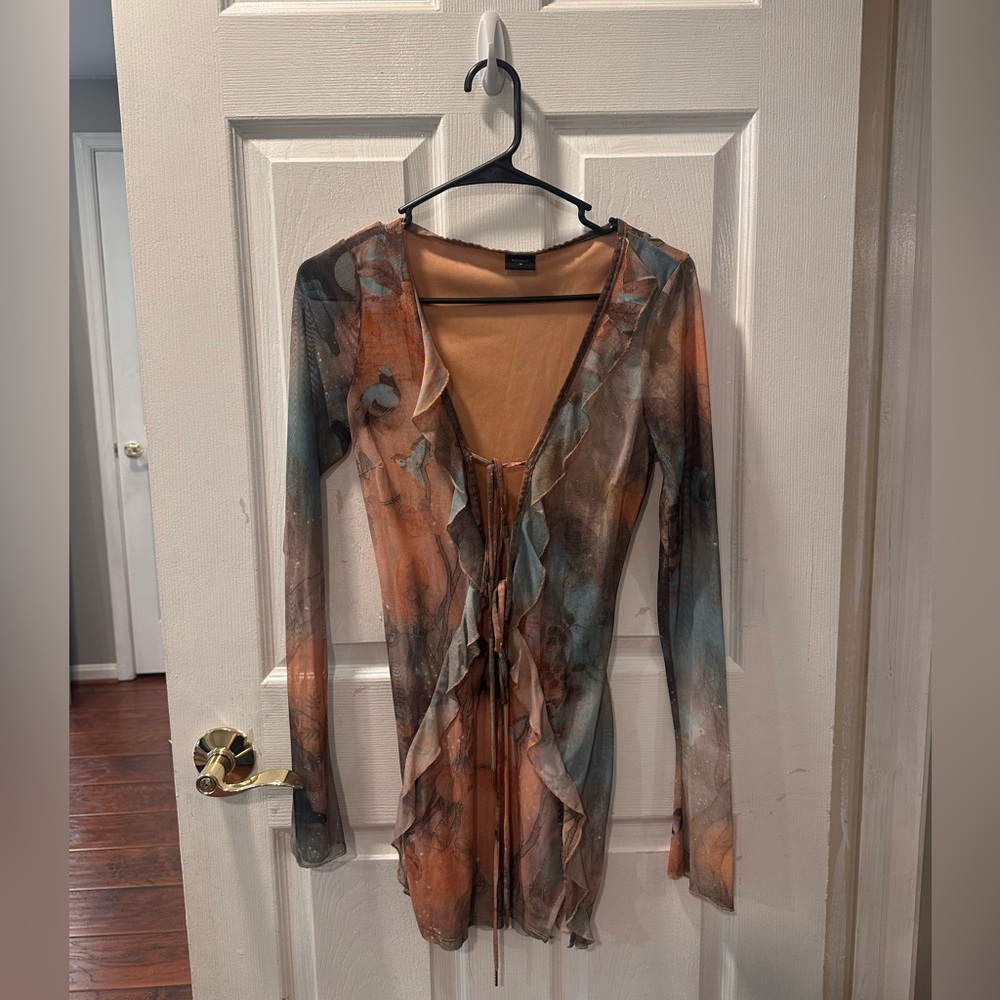 Sheer rust and teal dress with a tad bit of ruffle in the front and back.